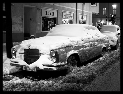 Mercedes Covered with Snow